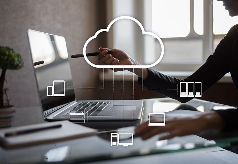 Cloud Migration Services Concept Laptop Overlay