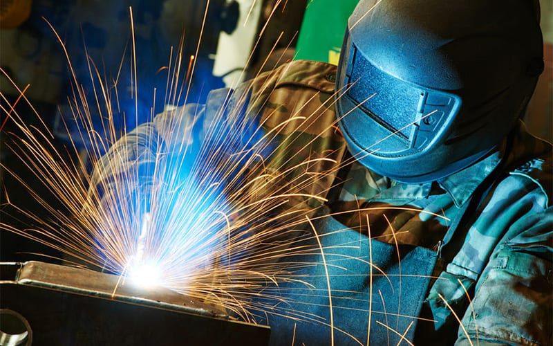 Manufacturer Welding with Sparks Photo