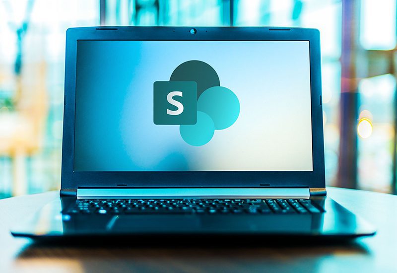 Microsoft SharePoint Online Logo Presented on Laptop